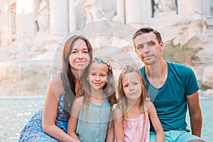 Portrait of family at Fontana di Trevi, Rome, Italy.