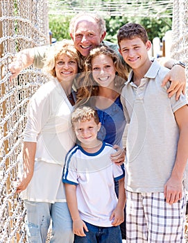 Portrait of family on hanging bridge