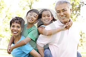 Portrait Of Family In Park