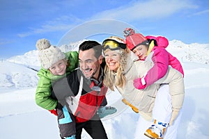 Portrait of a family in the ski slopes