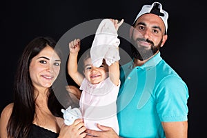 Portrait family of three mother daugter and arabic father