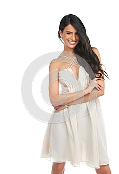 Portrait, fashion and happy woman with arms crossed in dress in studio isolated on a white background mockup. Smile