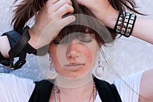 Portrait of Fashion Model Girl on the Industrial Background.