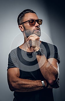 Portrait of fashionable male in sunglasses.