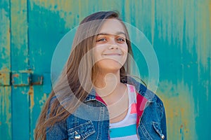 Portrait of fashionable teen girl with long hair.