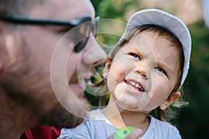 Portrait of Father and baby daughter together