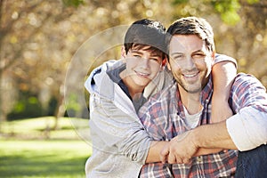 Portrait Of Father And Son In Countryside