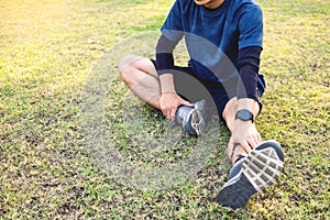 Portrait of fatigued young fit athletic man Muscular for health and strong guy exercising in sportswear outdoors