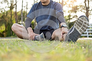 Portrait of fatigued young fit athletic man Muscular for health and strong guy exercising in sportswear outdoors