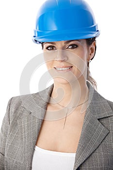 Portrait of female architect in hardhat