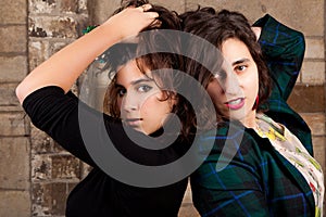 Portrait two female friends playing seducing photo