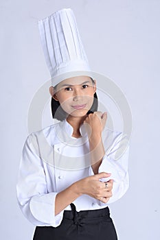 Portrait of female chef isolated on white