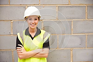 Portrait Of Female Construction Worker On Building Site