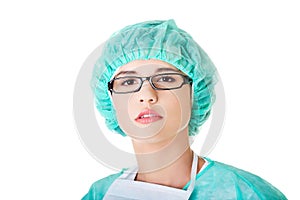 Portrait of female doctor in protective clothes