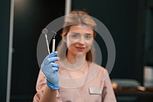 Portrait of female doctor. In the stomatological cabinet