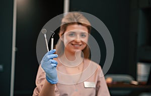 Portrait of female doctor. In the stomatological cabinet