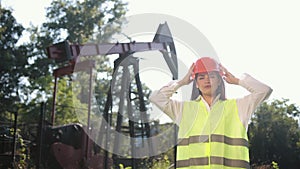 Portrait of female engineer. Female engineer looks directly at camera. Woman