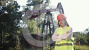 Portrait of female engineer. Female engineer looks directly at camera. Woman