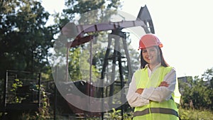 Portrait of female engineer. Female engineer looks directly at camera. Woman