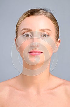 Woman face after plastic surgery. Anti-aging treatment and face lift.