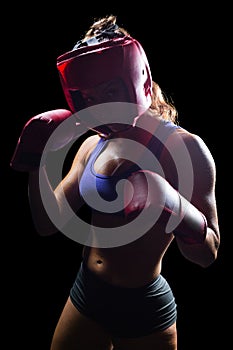 Portrait of female fighter with fighting stance