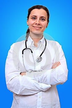 Portrait of female general practitioner in medical coat with stethoscope