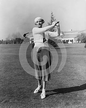 Portrait of female golfer