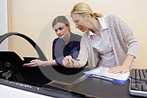 portrait female jet technician apprentice