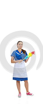 Portrait of female made, cleaning worker in white and blue uniform isolated over white background