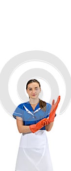 Portrait of female made, cleaning worker in white and blue uniform isolated over white background