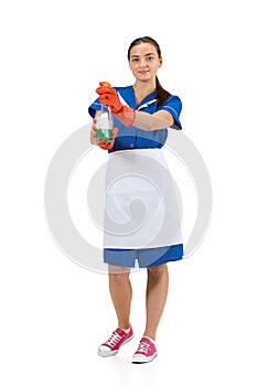 Portrait of female made, cleaning worker in white and blue uniform isolated over white background