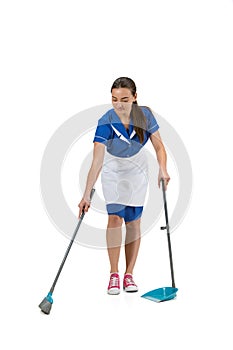 Portrait of female made, cleaning worker in white and blue uniform isolated over white background