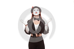 Portrait of a female mime artist performing, isolated on white background. Symbol of good news, happy event, come true