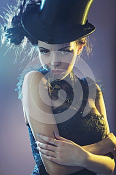 Portrait of the female model with the top hat