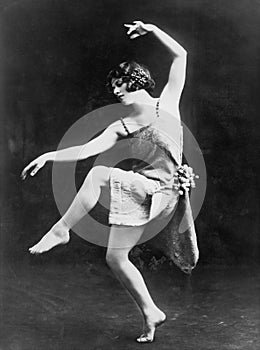 Portrait of female modern dancer performing photo