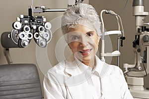 Portrait Of Female Optician In Surgery