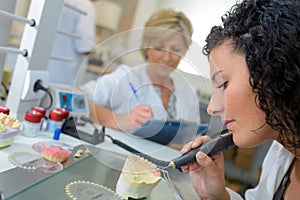 portrait female orthodontist working