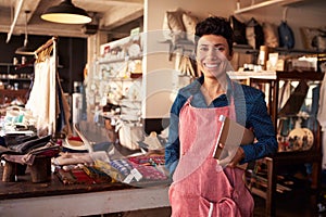 Portrait Of Female Owner Of Gift Store With Digital Tablet