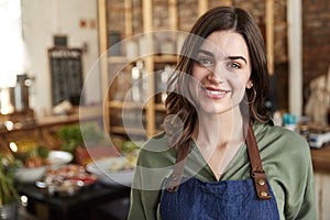 Portrait Of Female Owner Of Sustainable Plastic Free Grocery Store