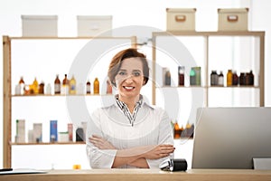 Portrait of female pharmacist in drugstore