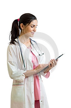 Portrait of female physician with clipboard isolated