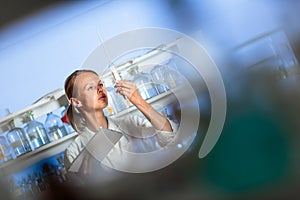 Portrait of a female researcher doing research in a lab