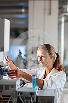 Portrait of a female researcher doing research in a lab