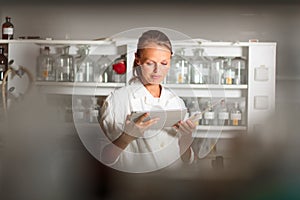 Portrait of a female researcher doing research in a lab