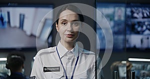 Portrait of female security worker looking at camera