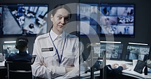 Portrait of female security worker looking at camera