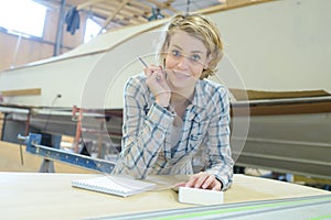Portrait female shipwright builder photo