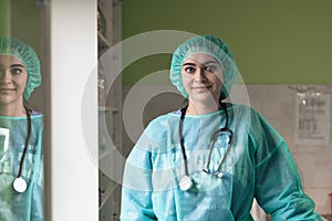 portrait of the female surgeon after an operation on animal hospital clinic surgery room