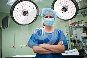 Portrait of a female surgeon standing in operation room