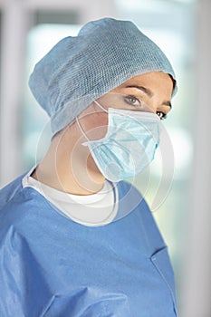 portrait female surgeon wearing mask